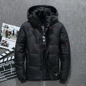 Black winter jacket with red accents on a gray background