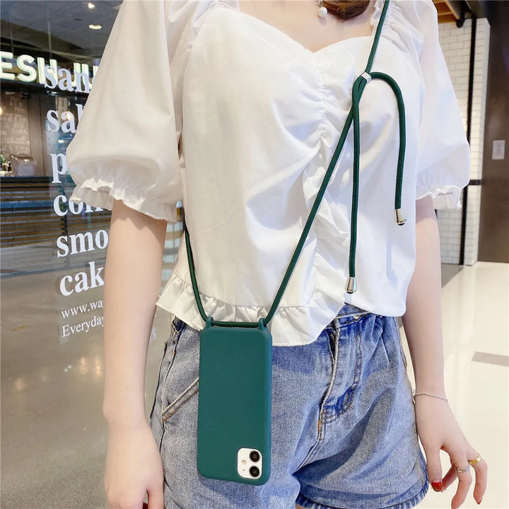 Colorful silicone iPhone case with a crossbody lanyard strap.