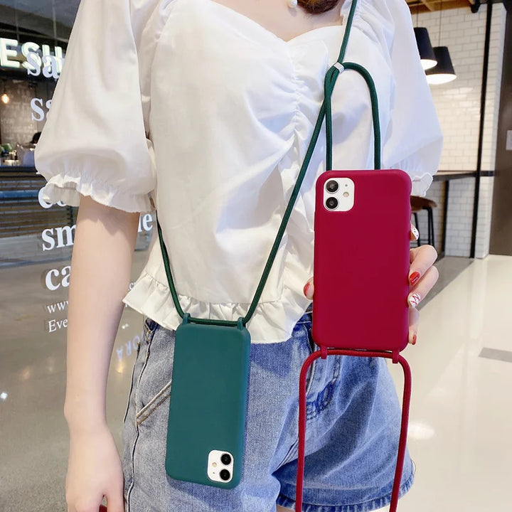Luxury iPhone case with a stylish chain necklace strap.
