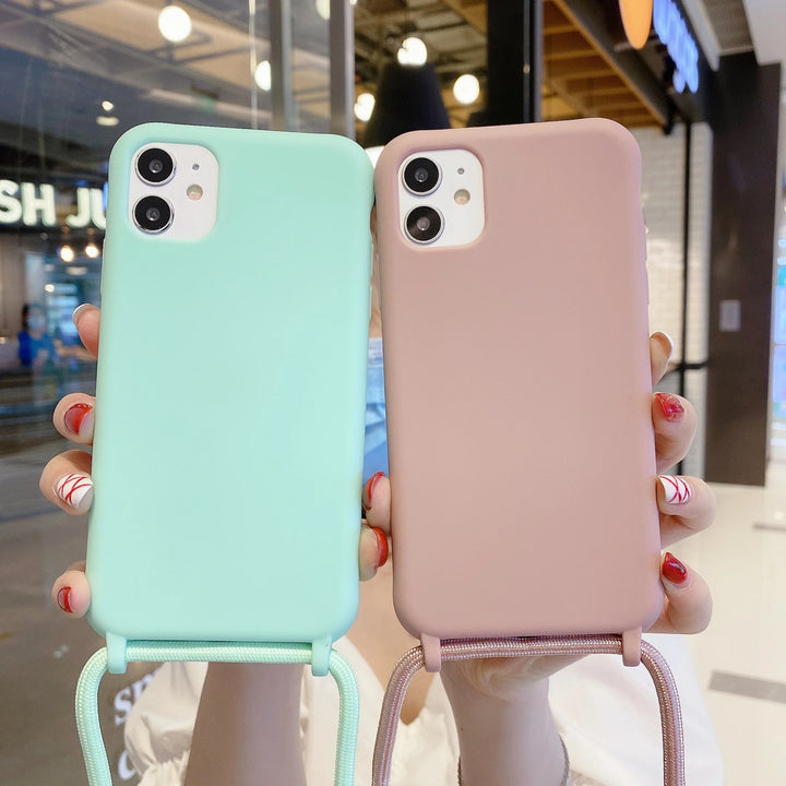 Colorful silicone iPhone case with a crossbody lanyard strap.