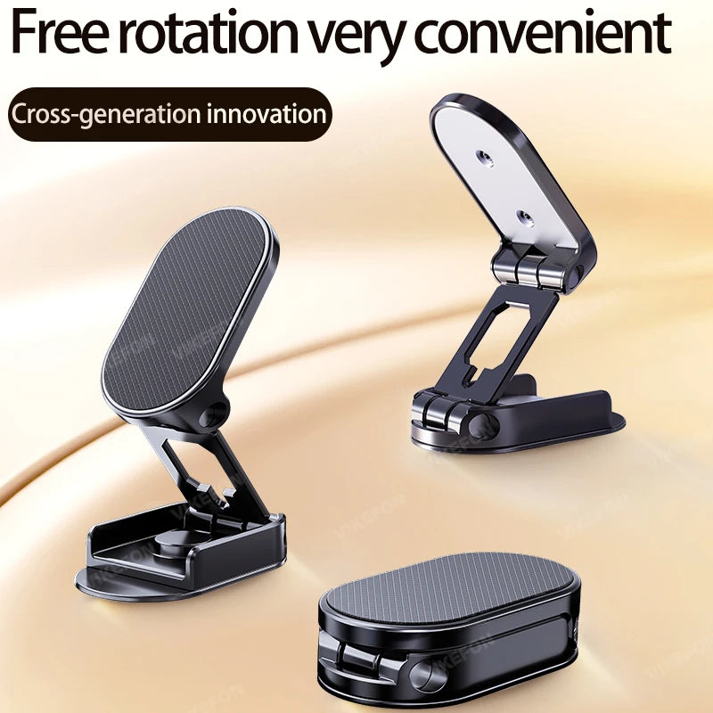Black phone holder with free rotation feature on a beige background