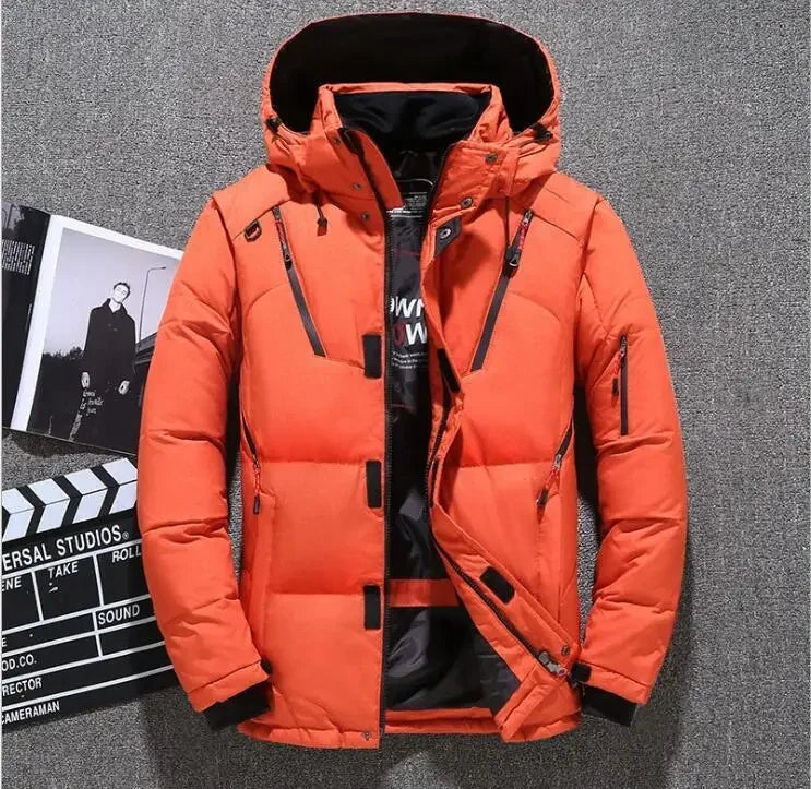 Orange winter jacket with black interior on a gray background