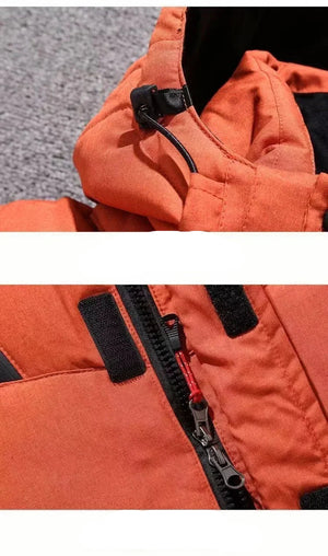 Close-up of an orange jacket with a zipper and stitching details.