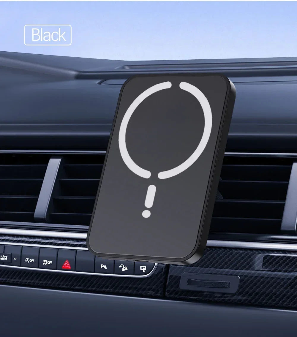 Black car phone holder with white design on a car dashboard