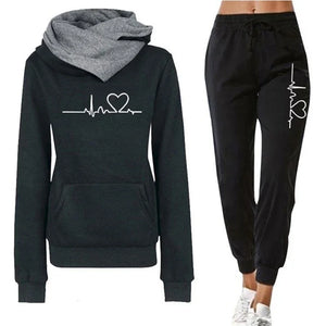 Black hoodie and jogger set with heart and heartbeat design on a white background