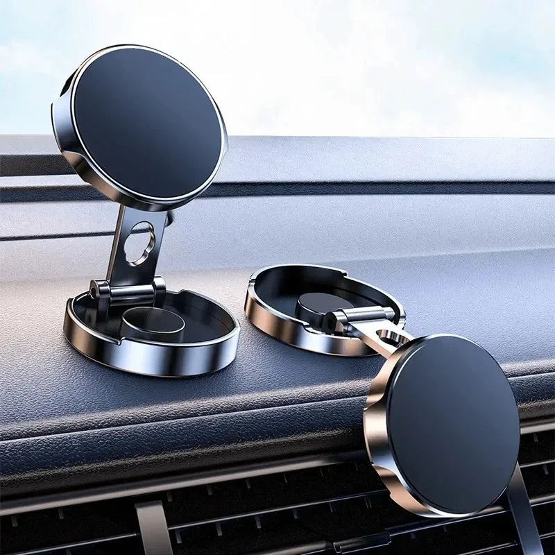 Two car phone holders on a car dashboard with a blurred background