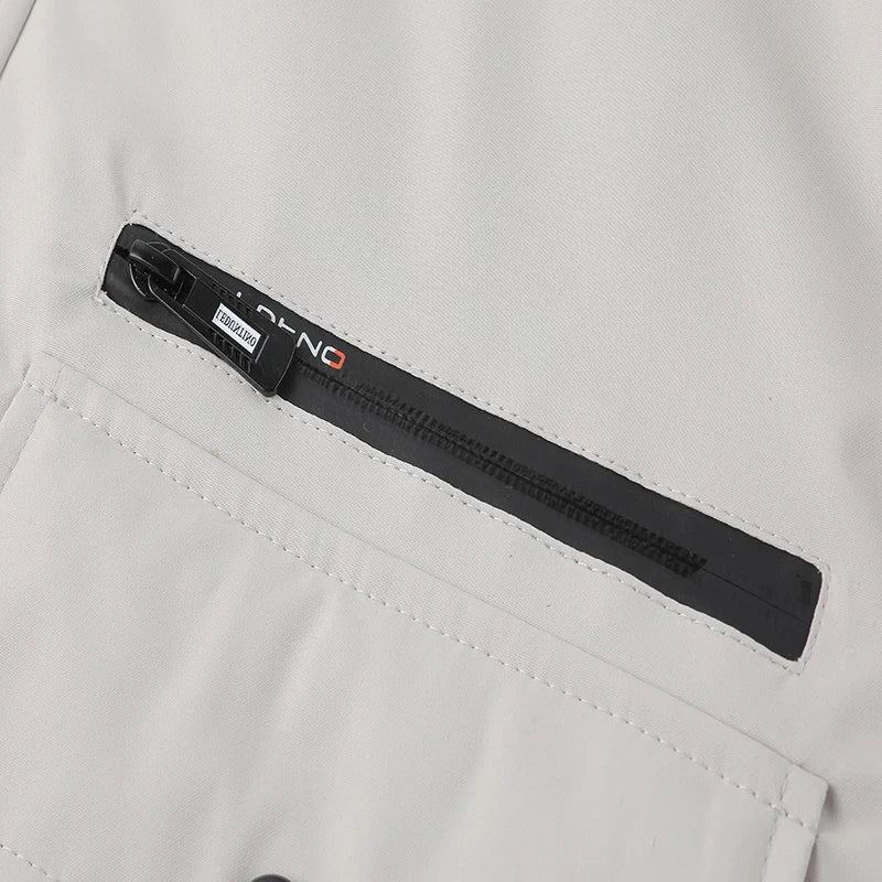 Close-up of a black belt with a brand logo on a light gray background