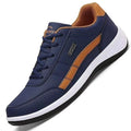 Blue sneaker with brown accents on a white background.