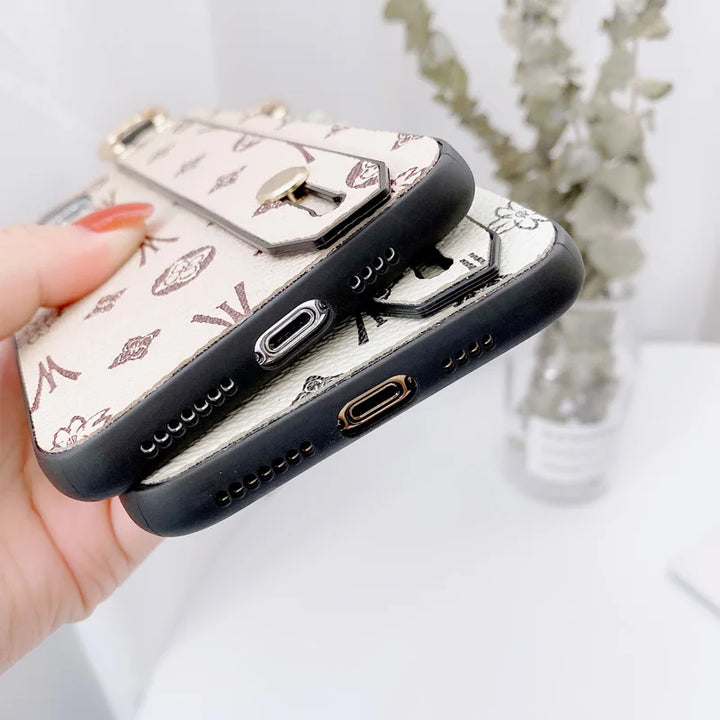 Luxury leather wristband phone case for iPhone, featuring jeweled and fabric designs, durable and stylish.