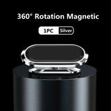 Silver 360-degree rotation magnetic phone holder on a black background