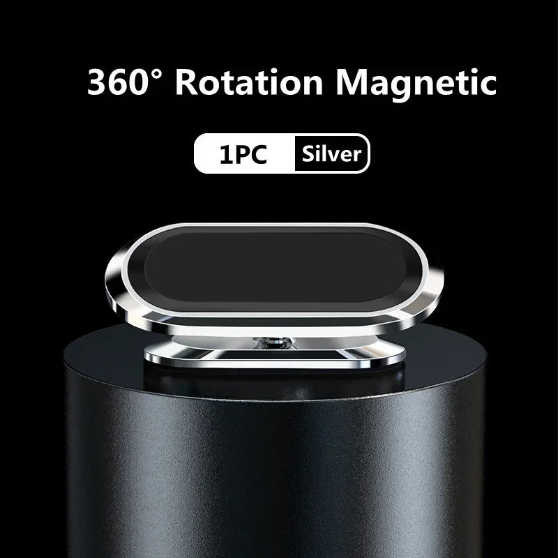 Silver 360-degree rotation magnetic phone holder on a black background