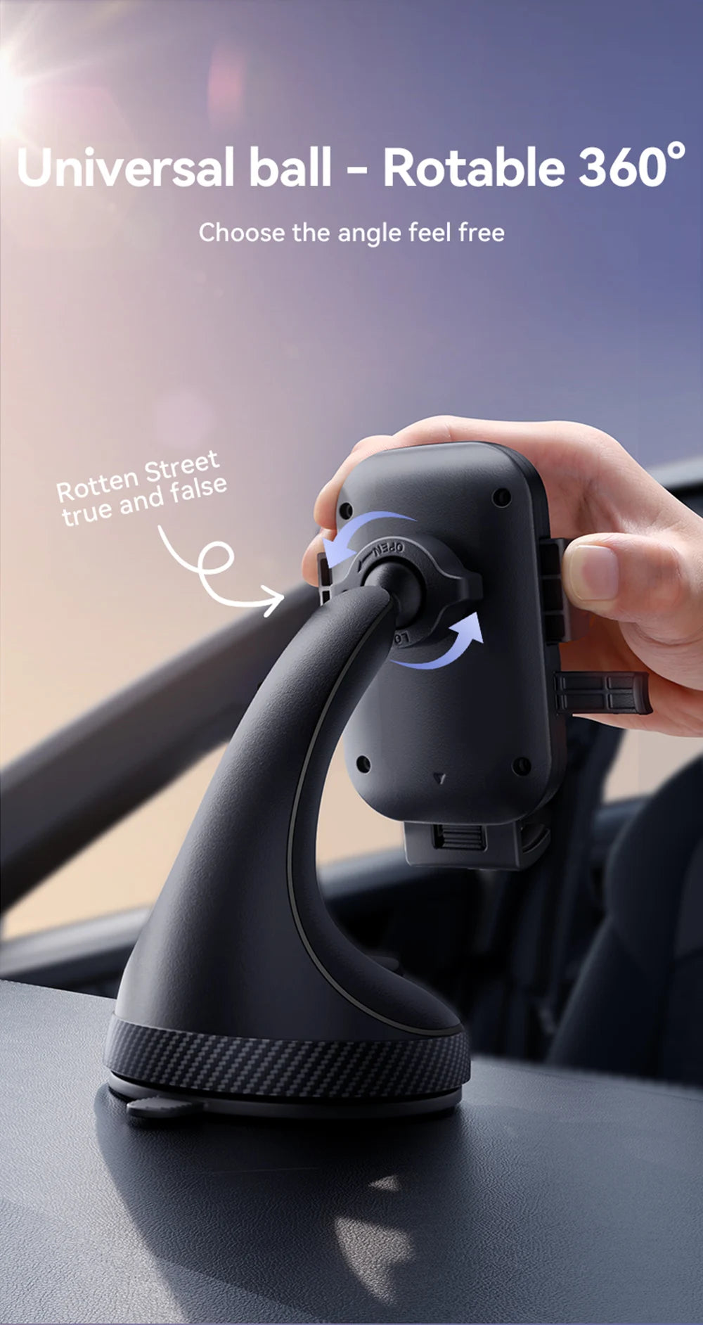 Car mount with a universal ball and rotatable feature, held by a hand inside a vehicle.